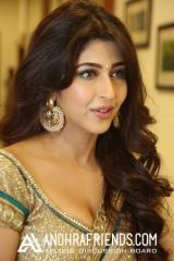 Sonarika Bhadoria Stills In Hot Gold Color Saree (5).jpg