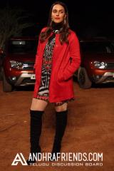 Neha Dhupia in Lulu and sky dress and Zara jacket and Stuartz wietzmen boots(2).jpeg