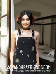 Gorgeous Adah with a quirky hairdo behind the scenes of an ad campaign